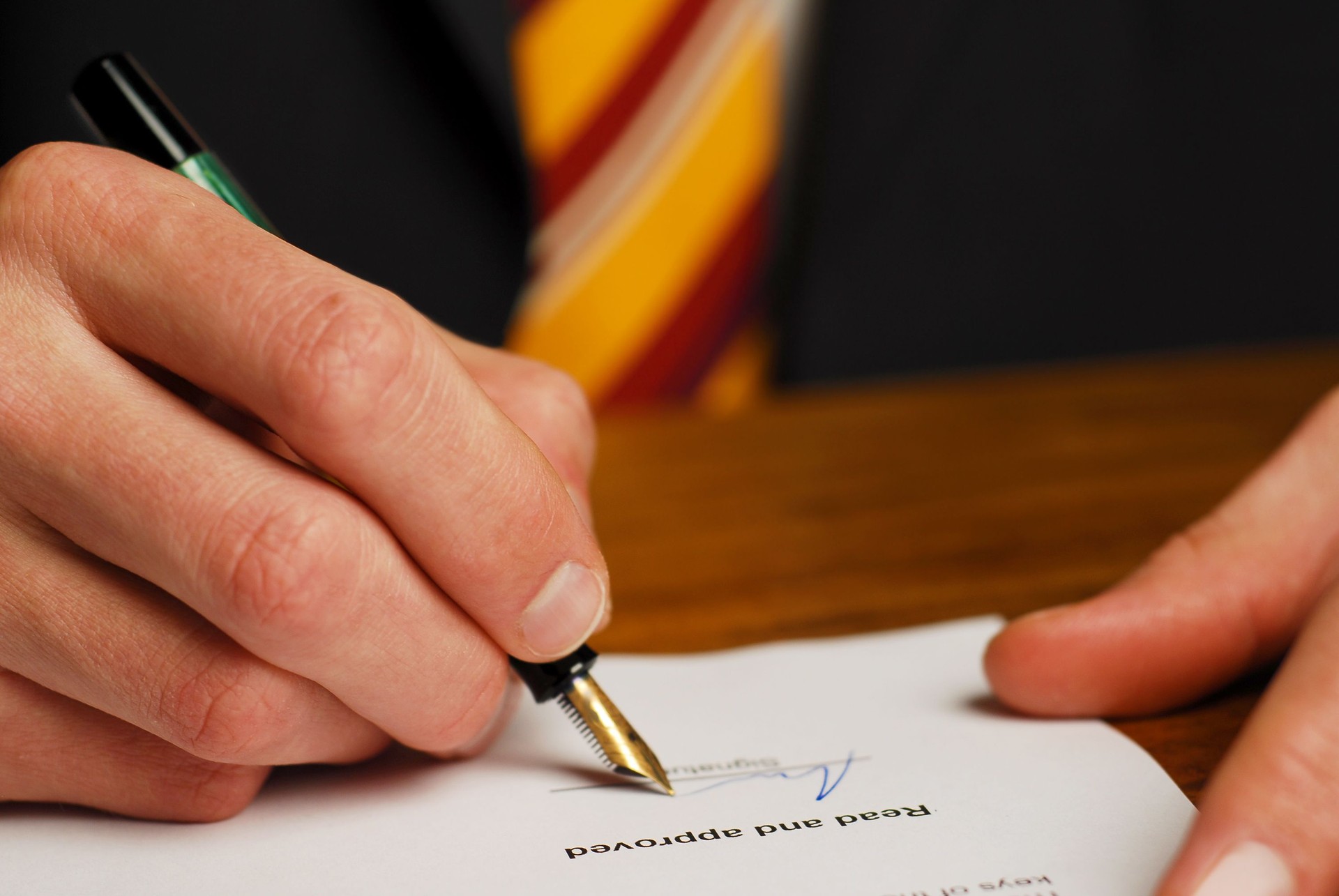 Lawyer signing a contract